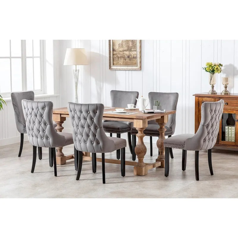 Sedia da pranzo in velluto con schienale ad ali e bordino con borchie - set da 2